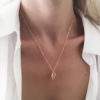 Collier tendance 2024 - coquillage or