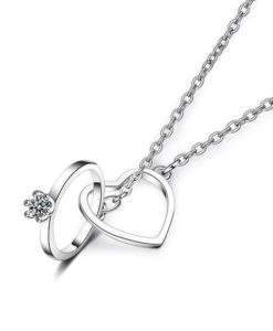 Collier avec pendentif bague et coeur en argent