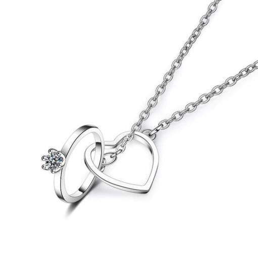 Collier avec pendentif bague et coeur en argent